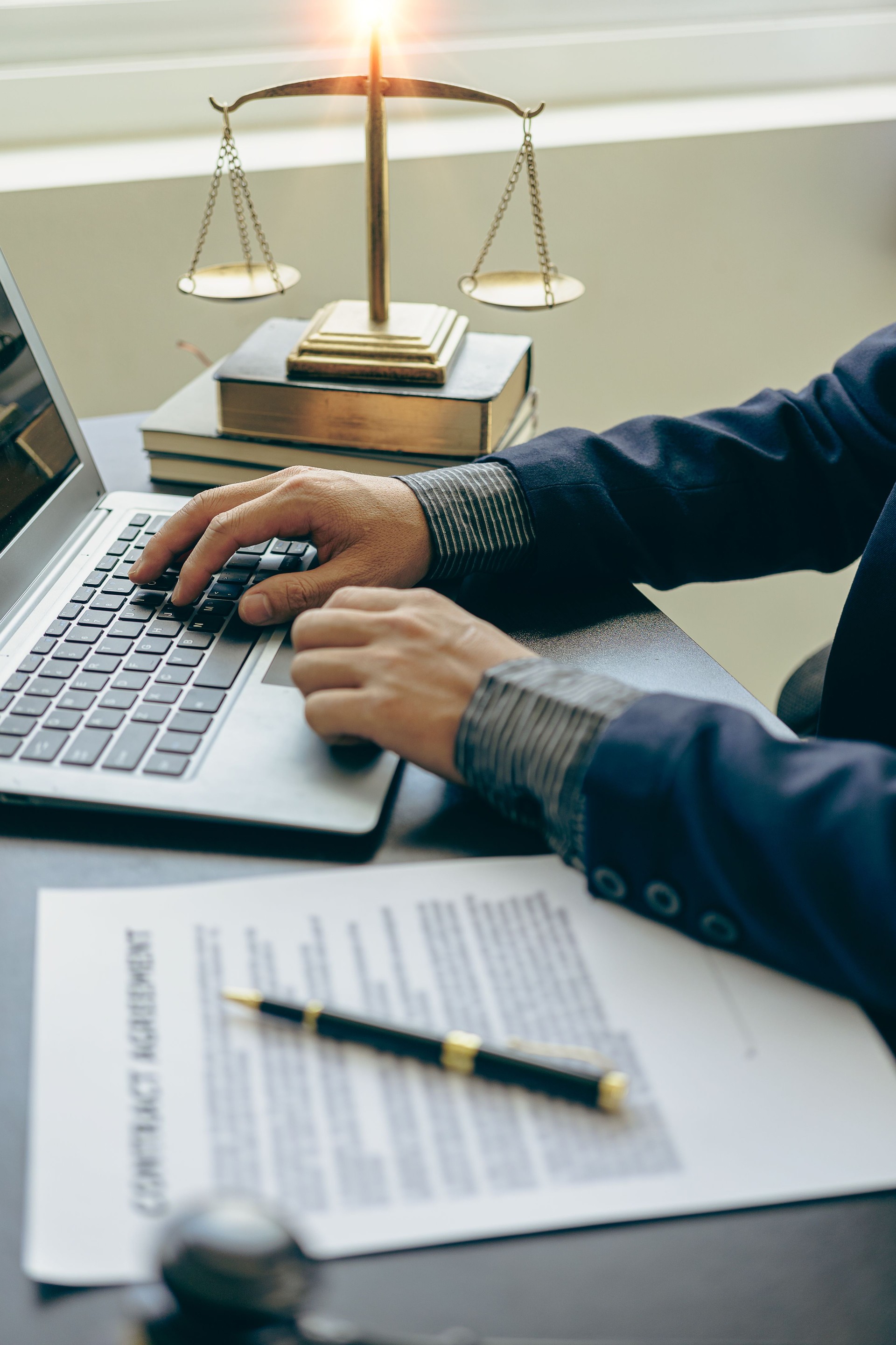 Judge hammer with judge, lawyer, businessman in suit working on legal documents in courtroom, justice and law, lawyer, judge, court concept vertical picture Judge hammer with judge, lawyer, businessman in suit working on legal documents in courtroom, justice and law, lawyer, judge, court concept vertical picture